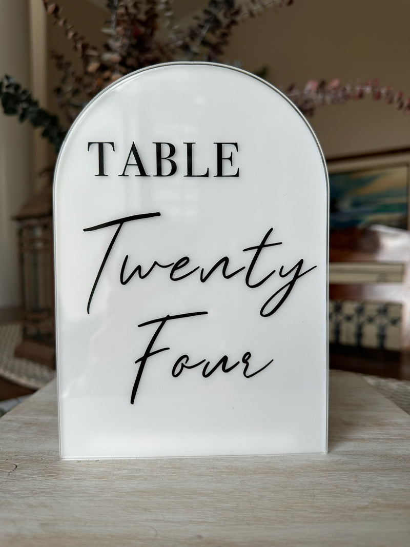Table number sign 'Table Twenty Four' on a white background