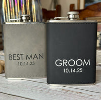 Two flasks, one labeled 'Best Man' and the other 'Groom', on a wooden surface.