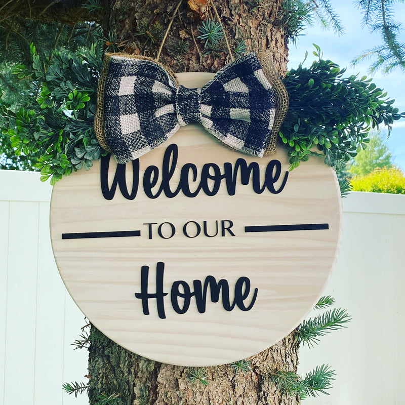 15" Round Welcome to Our Home Sign with Buffalo Check Ribbon